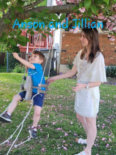 A picture containing grass, person, outdoor, childDescription automatically generated
